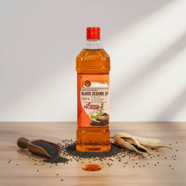 Cold pressed black sesame oil bottle with sesame seeds traditional gingelly oil
